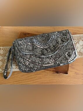 Silver Beaded & Sequined Evening Clutch loose threads. Some pilling